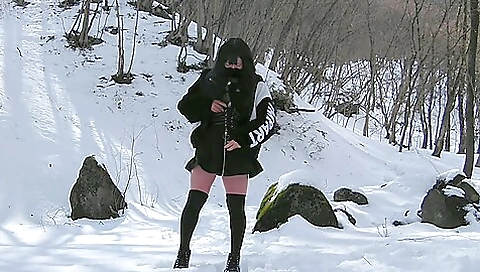 Asian brunette fucked outdoors in the snowy mountains