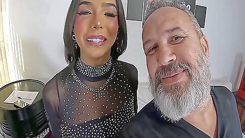 Latina in leather pantsuit gets a dildo in her ass