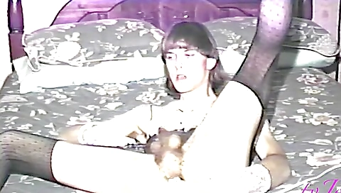 Busty brunette with hairy pussy looks at herself in mirror