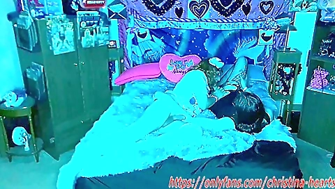 Cosplay sex scene of a brunette and a redhead in bed