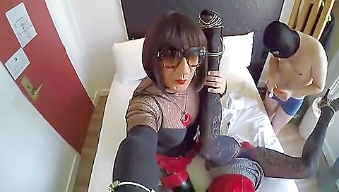 Amateur brunette in stockings with guys in hotel room