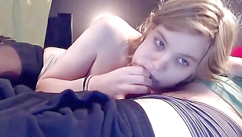 Blonde is making a video with hot action in the bedroom