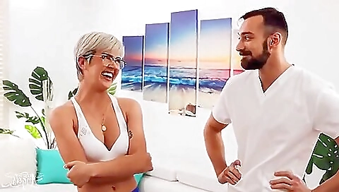 Blonde shemale getting oiled and fucked in a massage room